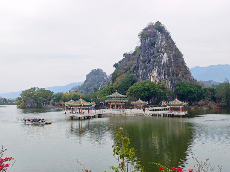 Wulong Pavilion with sightseeing boats at Seven Star Crags, Zhaoqing, Guangdong